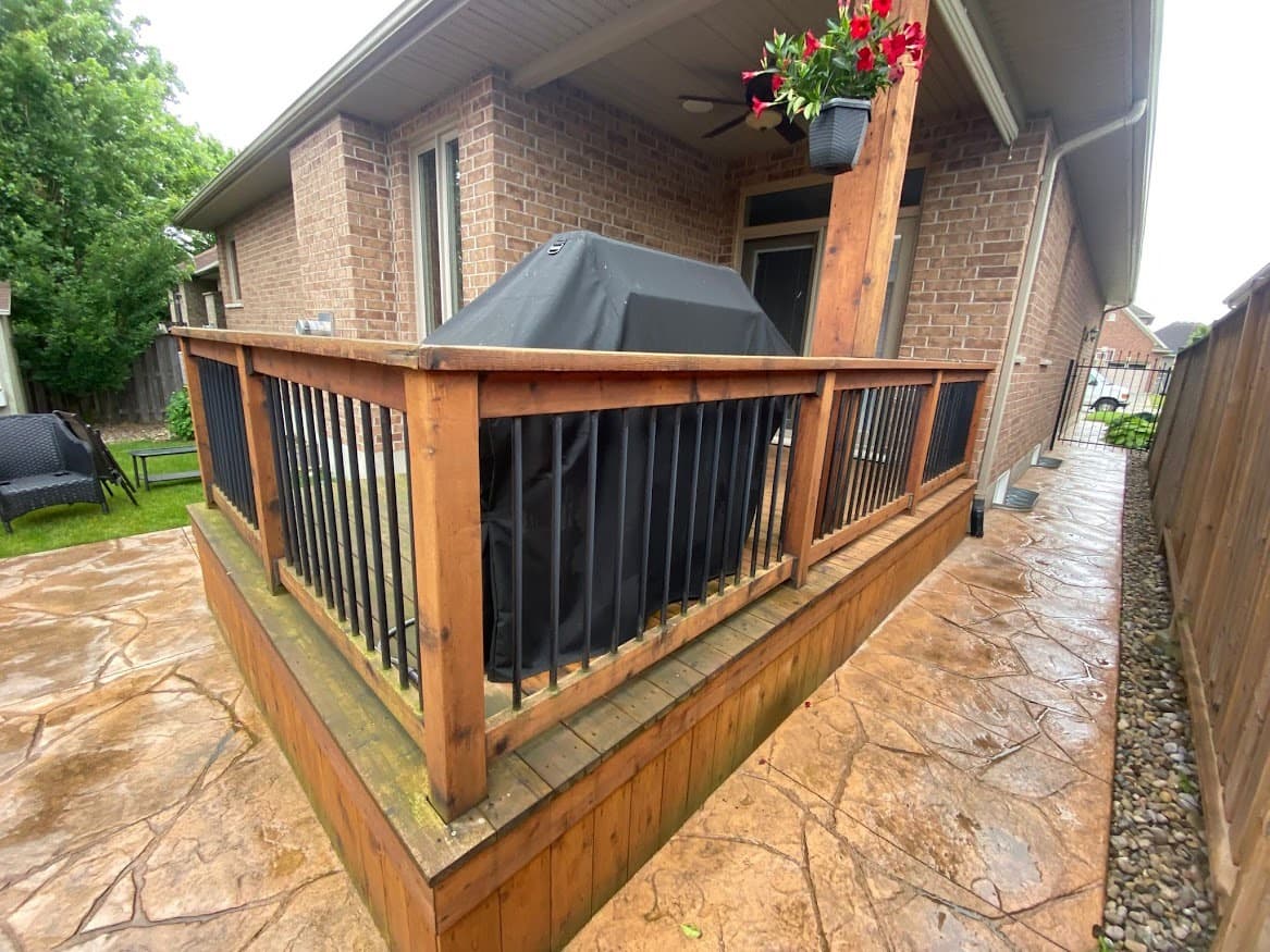 Deck before professional power washing and staining — worn boards in GTA